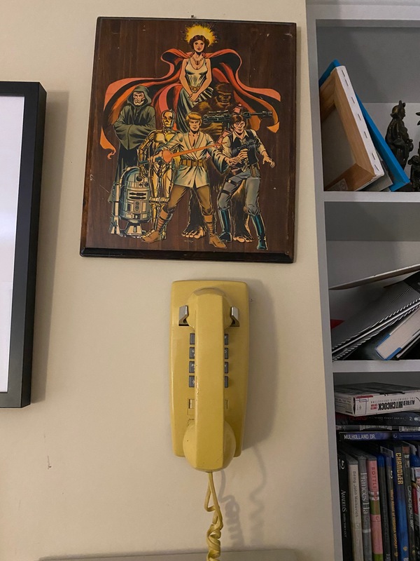 Star Wars plaque and landline phone from Too Many Cooks